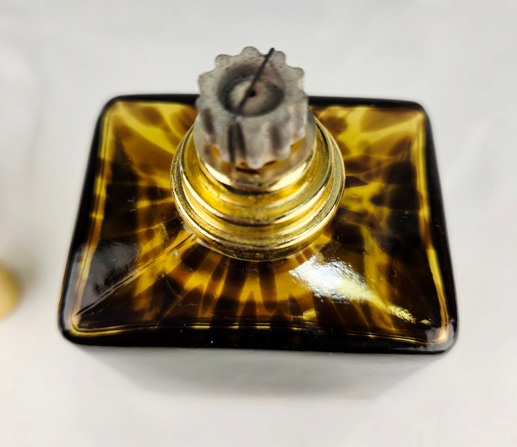 Petite Luxury for Your Fragrance Collection
La-Tee-Da Mini Collection Tortoise Glass Catalytic Fragrance Lamp Gold Crown Decor