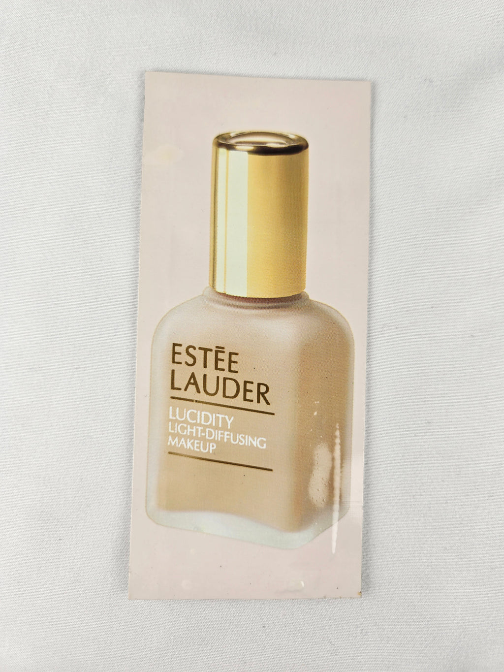 🎁 Present Pile Add-On | $25+ Order                    Estée Lauder Lucidity Light-Diffusing Makeup Sample – Neutral Beige 04