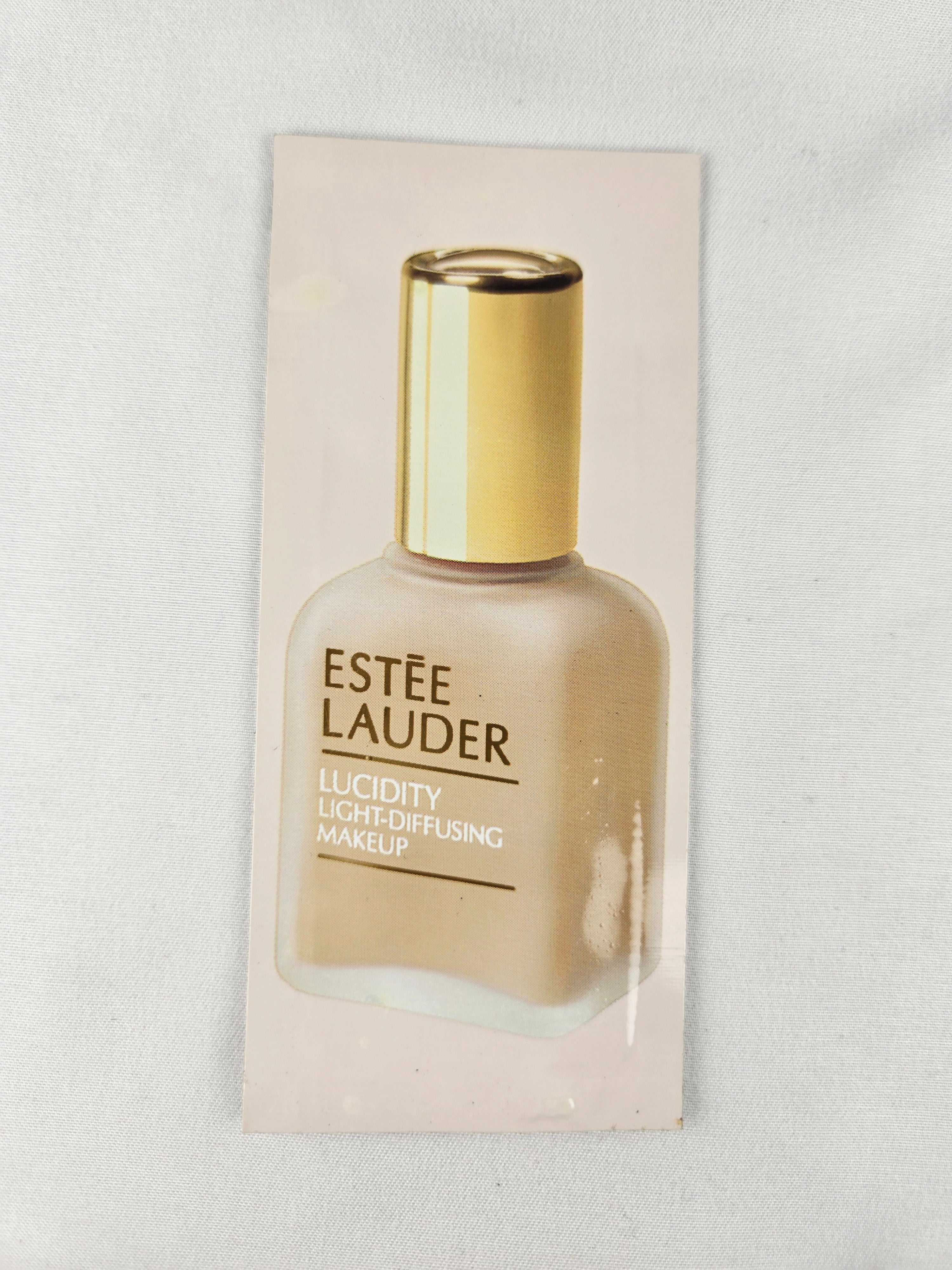 🎁 Present Pile Add-On | $25+ Order                    Estée Lauder Lucidity Light-Diffusing Makeup Sample – Neutral Beige 04