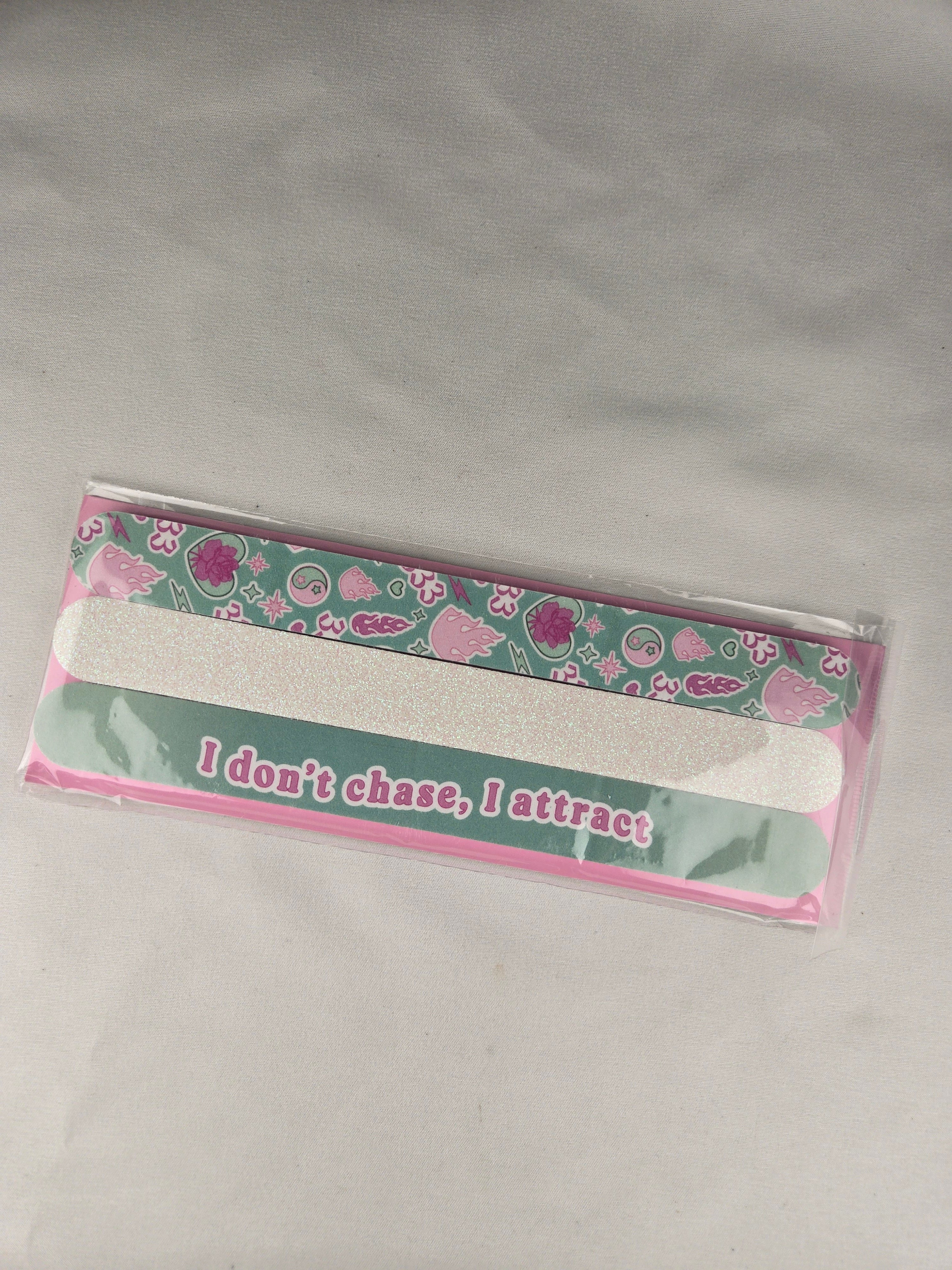 🎁 Present Pile Add-On | $25+ Order                       Affirmation Nail File Set – “I Don’t Chase, I Attract” (3 Pack)
