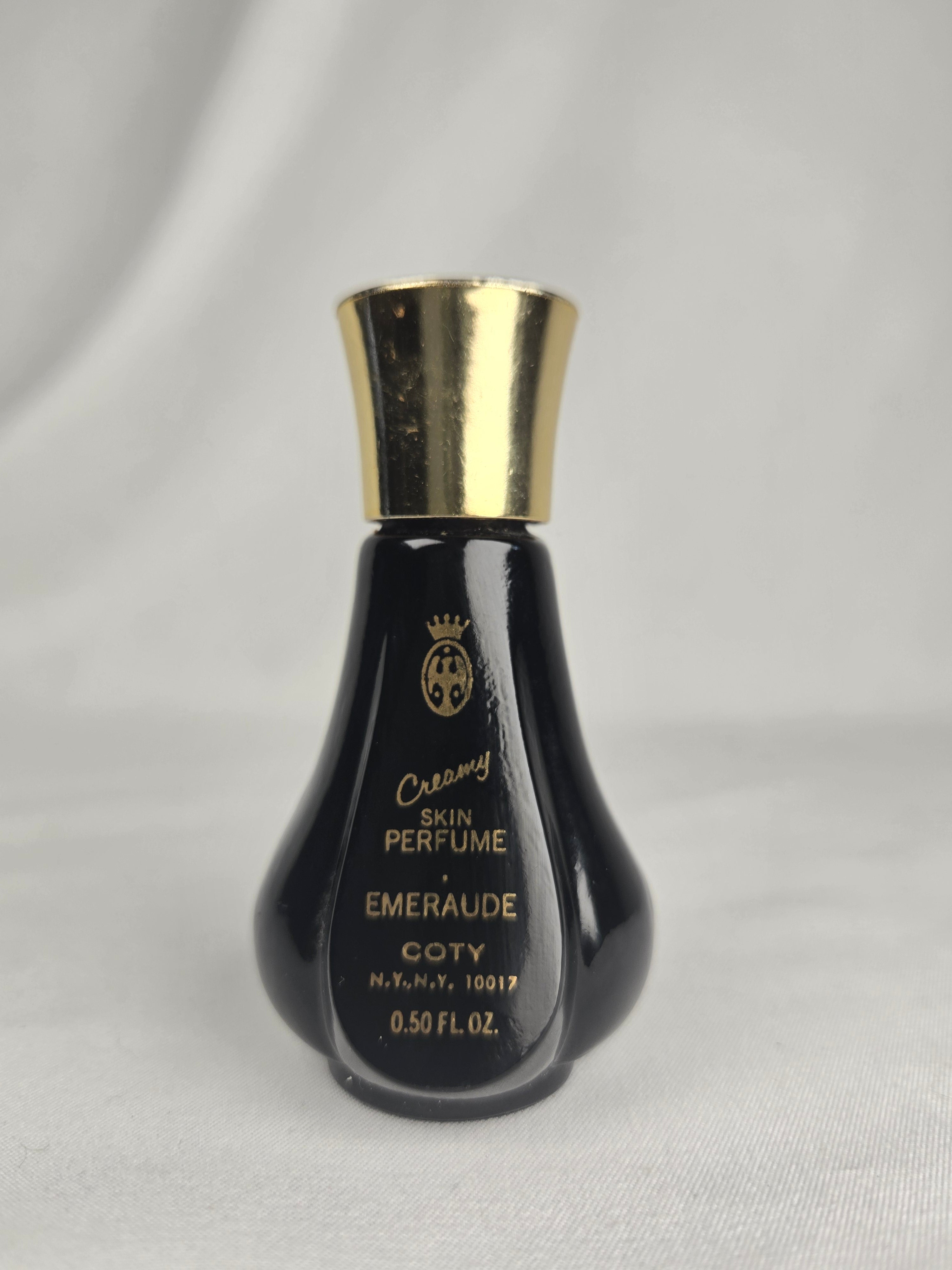 Vintage Coty Emeraude Creamy Skin Perfume 0.50 oz Black Bottle Gold Cap Classic Fragrance