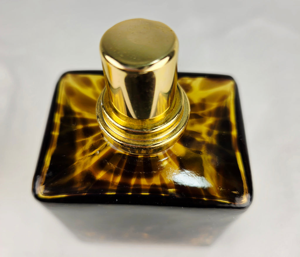 Petite Luxury for Your Fragrance Collection
La-Tee-Da Mini Collection Tortoise Glass Catalytic Fragrance Lamp Gold Crown Decor
