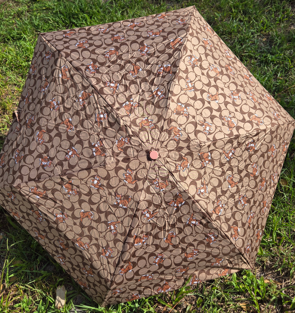Coach Signature Orange Cat Print Compact Folding Umbrella – Brown Monogram Travel Umbrella with Wrist Strap