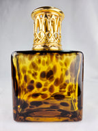 Petite Luxury for Your Fragrance Collection
La-Tee-Da Mini Collection Tortoise Glass Catalytic Fragrance Lamp Gold Crown Decor