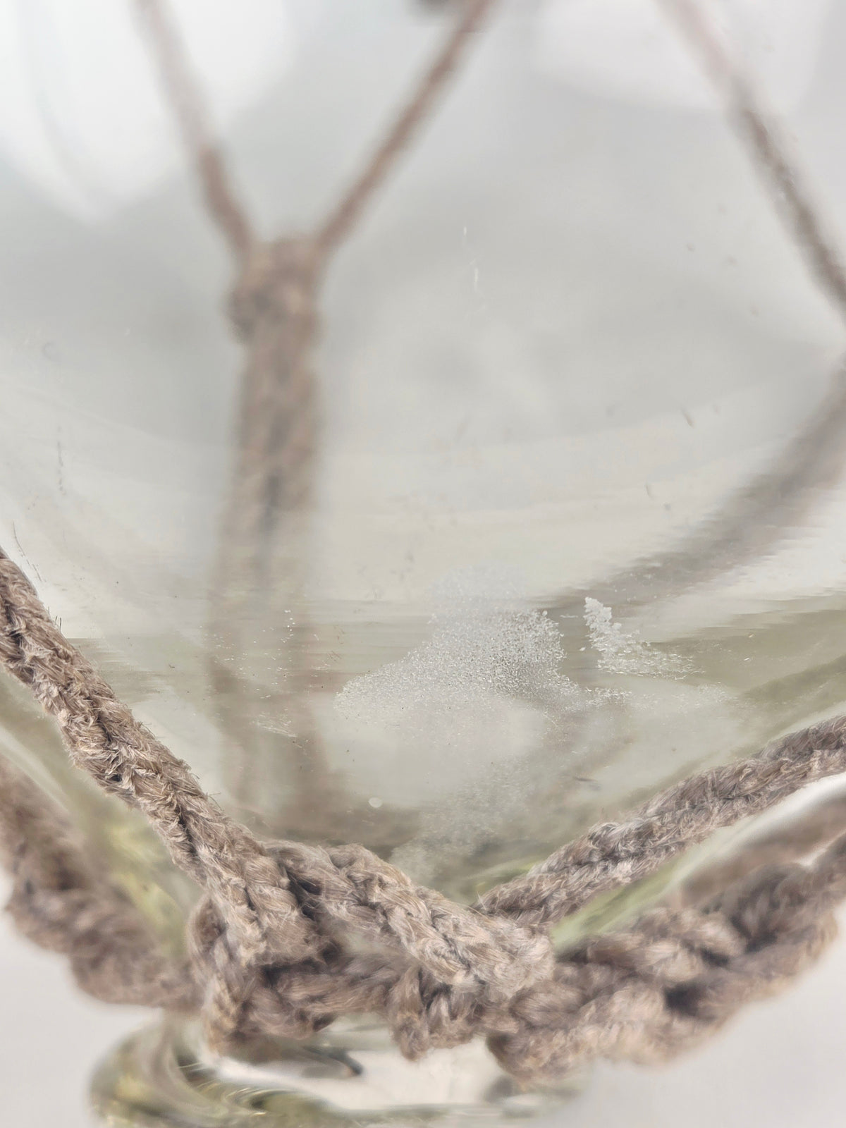 Vintage Clear Glass Fishing Float with Intricate Rope Netting – 7" Coastal Buoy with Internal "Sea-Mist" Patina Hand Blown