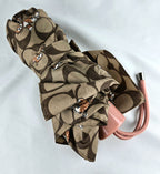 Coach Signature Orange Cat Print Compact Folding Umbrella – Brown Monogram Travel Umbrella with Wrist Strap