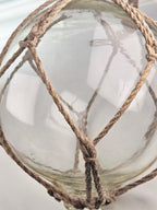 Vintage Clear Glass Fishing Float with Intricate Rope Netting – 7" Coastal Buoy with Internal "Sea-Mist" Patina Hand Blown