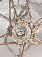 Vintage Clear Glass Fishing Float with Intricate Rope Netting – 7" Coastal Buoy with Internal "Sea-Mist" Patina Hand Blown
