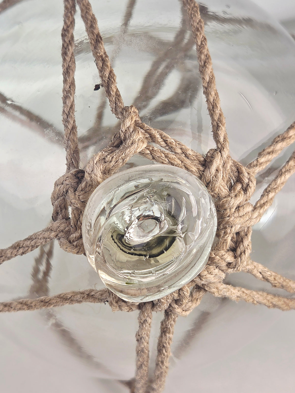 Vintage Clear Glass Fishing Float with Intricate Rope Netting – 7" Coastal Buoy with Internal "Sea-Mist" Patina Hand Blown