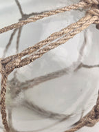 Vintage Clear Glass Fishing Float with Intricate Rope Netting – 7" Coastal Buoy with Internal "Sea-Mist" Patina Hand Blown