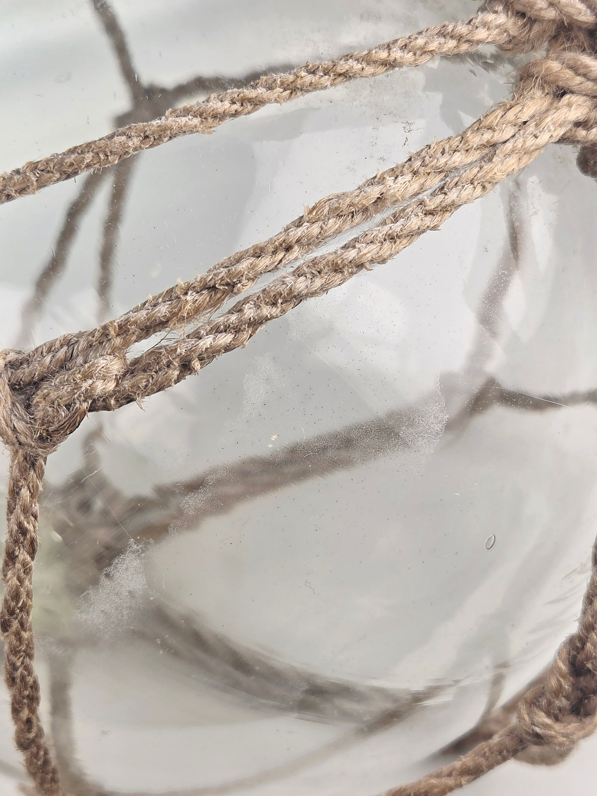 Vintage Clear Glass Fishing Float with Intricate Rope Netting – 7" Coastal Buoy with Internal "Sea-Mist" Patina Hand Blown